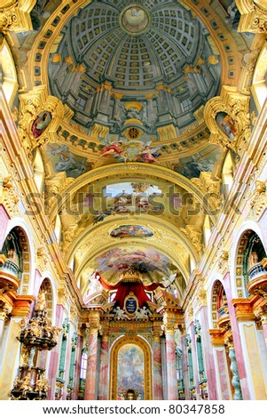 The remarkable trompe l\'oeil dome of the Jesuit Church (Jesuitenkirche), a two-floor, double-tower church in Vienna, Austria, influenced by early Baroque principles but remodeled in 1703-1705.