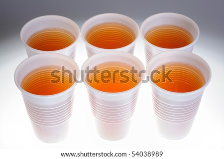Plastic glasses with a drink