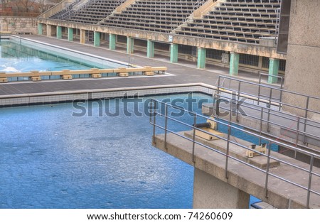 Diving board and outdoor swimming pool in the spring. HDR composite (5 exposures) shots.