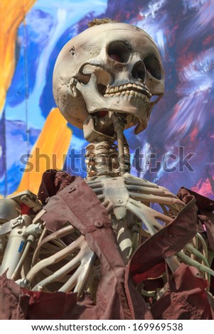 Skeleton at a amusement park ghost train