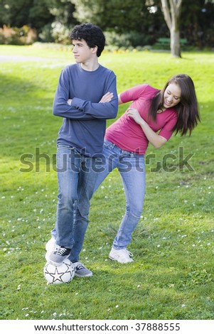 Cảm Cười...chơi - Page 17 Stock-photo-portrait-of-teen-boy-with-soccer-ball-ignoring-teen-girl-37888555