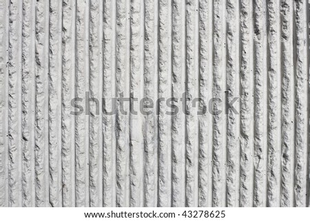 concrete wall detail. stock photo : Closeup Detail of a Gray Concrete Wall With a Stripe Pattern