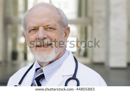 Portrait of an Old Male Doctor with a Stethoscope around His Neck