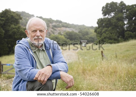 Portrait of an Old Man Resting on a Hiking Trail