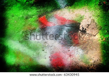 Grunge background / texture on a green stone wall with splashes of paint. Could be useful as a frame or a texture.