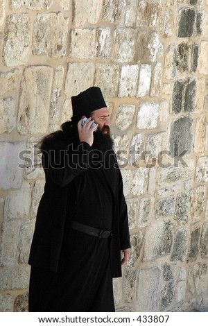 jerusalem priest orthodox israel cell phone shutterstock lightbox