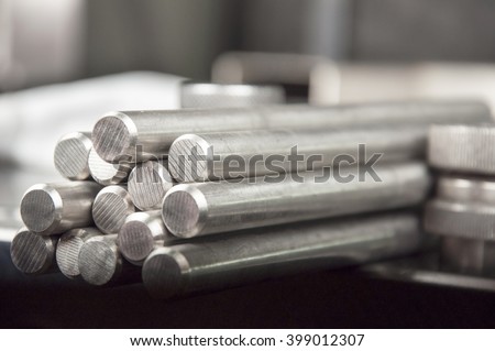 stainless steel rods on a welding table