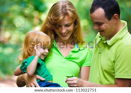 Portrait of Happy Family In Park - outdoor shot