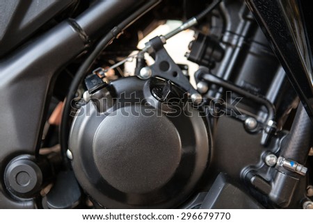 This is close up of motorbike engine.