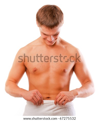 stock photo Happy young man looking at his penis isolated over white