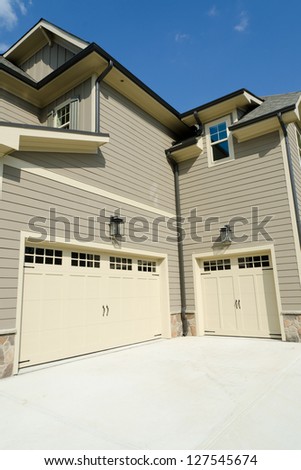 Residential house three car garage doors
