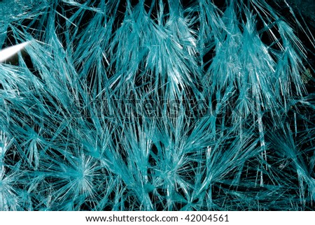 Crystals of copper chloride on black background