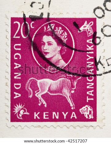 CIRCA 1960: A stamp printed in East Africa from a first day cover of an animal and plant series  showing an image of a wildebeeste, circa 1960.