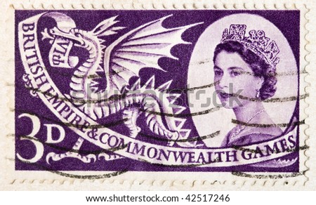 CIRCA 1958: A  stamp printed in Britain showing a Welsh dragon celebrating the British Empire and Commonwealth games, circa 1958.