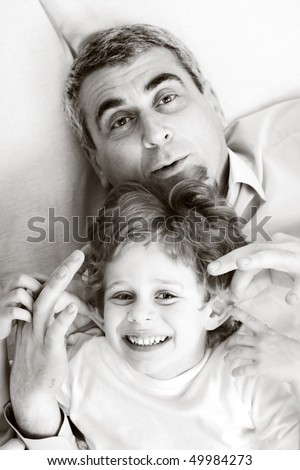 happy family home: father, mother and - black and white photo