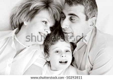 happy family home: father, mother and - black and white photo