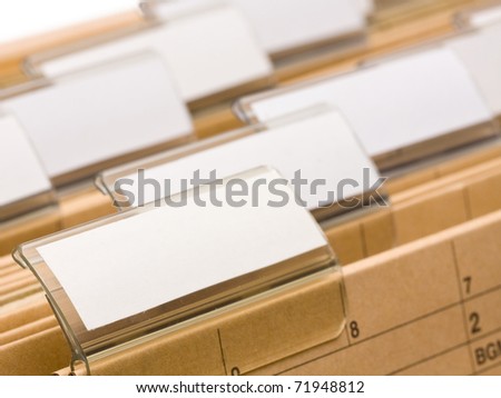 Series of office folders with blank labels