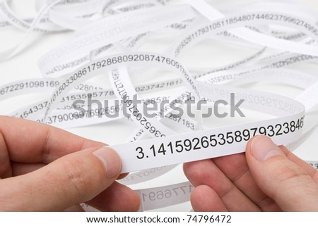 Researcher holding start of printout of the number PI
