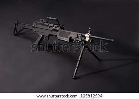 modern us army machine gun on black background