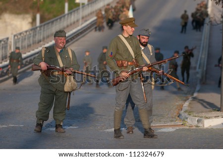 KAMYANETS-PODILSKY, UKRAINE - AUGUST 24: Members of  history clubs reenact the Civil War in Ukraine 1917-1921, August 24, 2012 in Kamyanets-Podilsky, Ukraine