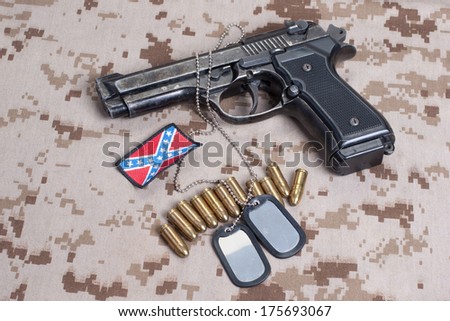 Beretta hand gun on  desert marines uniform