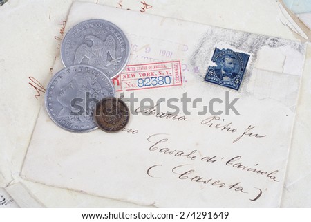 Vintage background with old paper, old ink pen, handwriten letters and silver coins