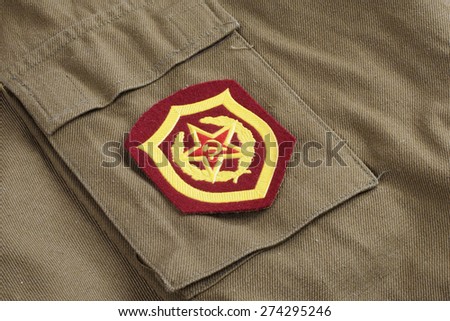 Soviet Army Mechanized infantry shoulder patch on khaki uniform background
