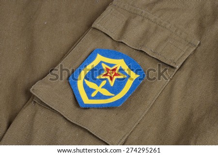 Soviet Army Air Force shoulder patch on khaki uniform background