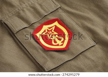 Soviet Army Military Orchestra Service shoulder patch on khaki uniform background