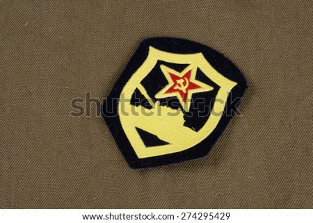 Soviet Army Tank Corps shoulder patch on khaki uniform background