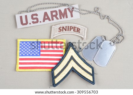 KIEV, UKRAINE - August 21, 2015.  US ARMY Corporal rank patch,  sniper tab, flag patch and dog tag