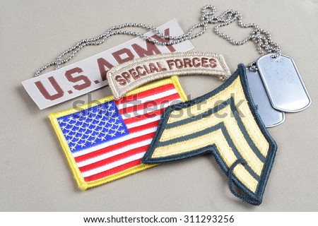 KIEV, UKRAINE - August 21, 2015.  US ARMY Sergeant rank patch, special forces tab, flag patch and dog tag