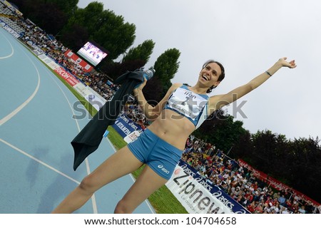 TURIN, ITALY - JUNE 08: Martina Amidei ITA cheers after winning 100m sprint race during the International Track & Field meeting Memorial Nebiolo 2012 on June 08, 2012 in Turin, Italy.