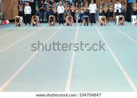TURIN, ITALY - JUNE 08: Many athletes bolt off for 100m women sprint race during the International Track & Field meeting Memorial Nebiolo 2012 on June 08, 2012 in Turin, Italy.