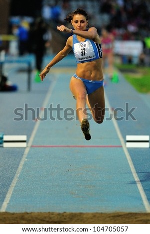 TURIN, ITALY - JUNE 08: Eleonora D\'Elicio ITA performs triple jump during the International Track & Field meeting Memorial Nebiolo 2012 on June 08, 2012 in Turin, Italy.