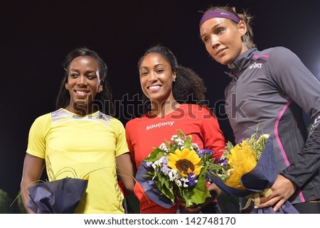 TURIN - JUNE 8: (from left) Porter Tiffany, Harrison Queen, Lolo Jones stands at 110m hurdles woman race podium at XIX International Track and Field meeting, Italy on 8th june 2013, in Turin, Italy.