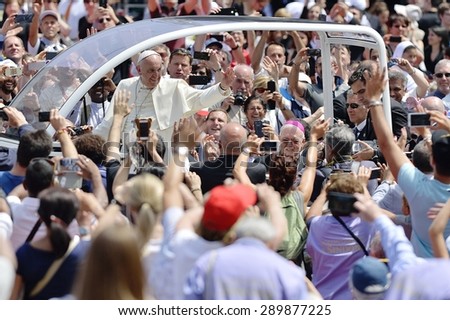 TURIN, ITALY - JUNE 21, 2015: Holy Father Pope Francesco Bergoglio visit Turin for the holy Shroud exhibition and the city cheers him with a joyful crowd in Vittorio Place.