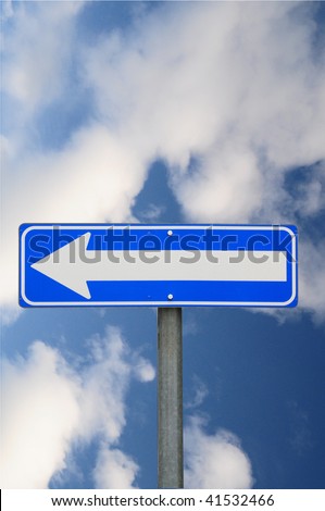 One way road sign, left direction on a sky background
