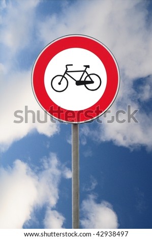 Road sign transit interdiction to bicycle on sky background