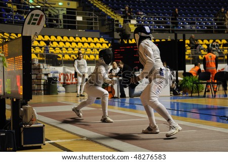 TURIN - FEB 7: Women Foil World Cup, match of team tournament Usa vs Puerto Rico on  February 7, 2010 in Turin, Italy.