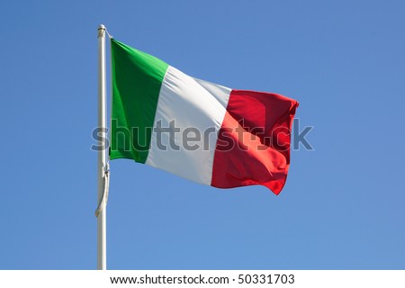 Full Italy flag on a blue sky