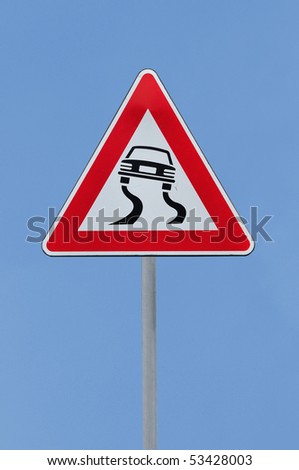 Road sign slippery dangerous road