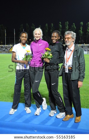 TURIN, ITALY - JUNE 12: Gordeyeva RUS (1st) Spencer LCA (2nd) Howard Lowe USA (3rd) stand high jump podium of 2010 Memorial Primo Nebiolo track and field meeting, on June 12, 2010 in Turin, Italy.
