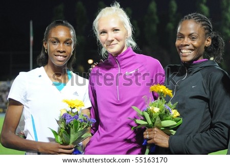 TURIN, ITALY - JUNE 12: Gordeyeva RUS (1st) Spencer LCA (2nd) Howard Lowe USA (3rd) stand high jump podium of 2010 Memorial Primo Nebiolo track and field meeting, on June 12, 2010 in Turin, Italy.