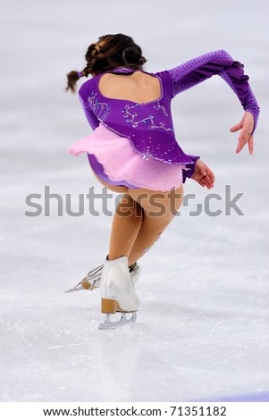 PINEROLO, TURIN - FEB 12: woman athlete perform at ice figure skating local championship on February 12, 2011 in Pinerolo, Turin, Italy