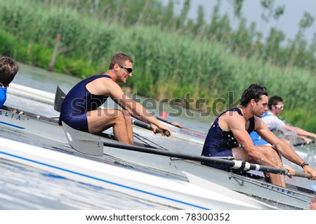 CANDIA, TURIN, ITALY - MAY 22: CUS Pisa coxed pair (2+) crew rowing during 2011 Rowing CNU University National Championship on May 22, 2011 on Candia lake, Turin, Italy