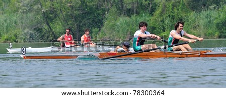 CANDIA, TURIN, ITALY - MAY 22: the CUS Milano coxed pair (2+) crew rowing during 2011 Rowing CNU University National Championship on May 22, 2011 on Candia lake, Turin, Italy