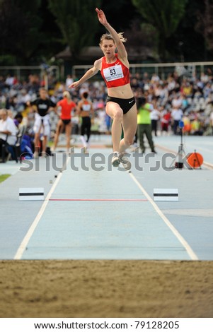 TURIN, ITALY - JUNE 10: Taranova Anastasia (RUS) performs triple jump during the 2011 Memorial Primo Nebiolo track and field athletics international meeting, on June 10, 2011 in Turin, Italy.