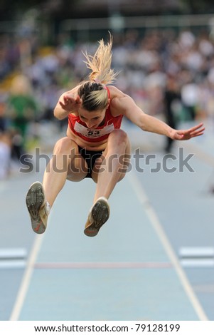 TURIN, ITALY - JUNE 10: Taranova Anastasia (RUS) performs triple jump during the 2011 Memorial Primo Nebiolo track and field athletics international meeting, on June 10, 2011 in Turin, Italy.