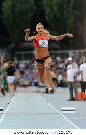 TURIN, ITALY - JUNE 10: Rodic Snezana (SLO) performs triple jump during the 2011 Memorial Primo Nebiolo track and field athletics international meeting, on June 10, 2011 in Turin, Italy.